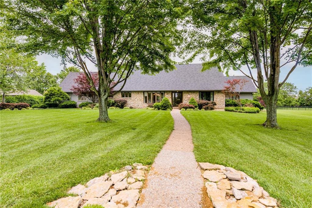 11280 W 155th Ter, Overland Park, KS 66221 - ranch-style house featuring a front lawn