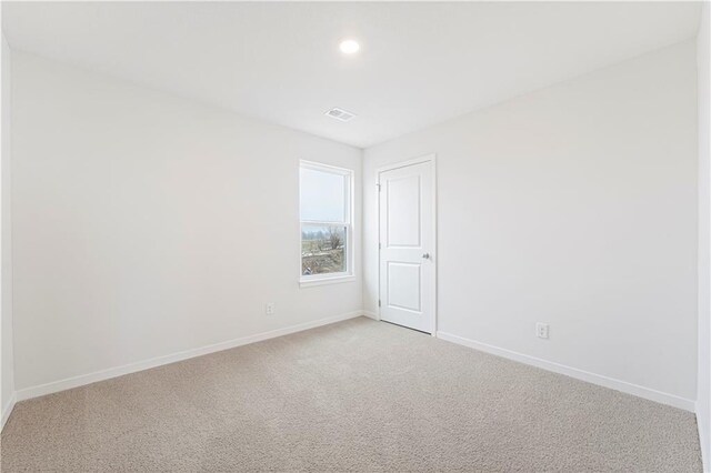 5000 NW 141st St, Platte City, MO 64079 - empty room with baseboards, light colored carpet, and recessed lighting