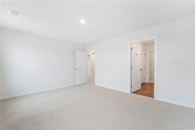 5000 NW 141st St, Platte City, MO 64079 - carpeted spare room featuring baseboards and recessed lighting