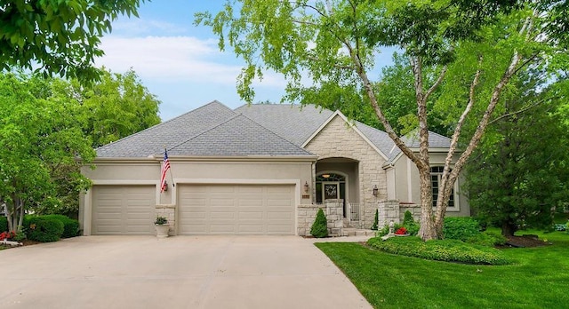 5610 W 131st Ter, Overland Park, KS 66209 - view of front of property with stone siding, an attached garage, driveway, stucco siding, and a front yard