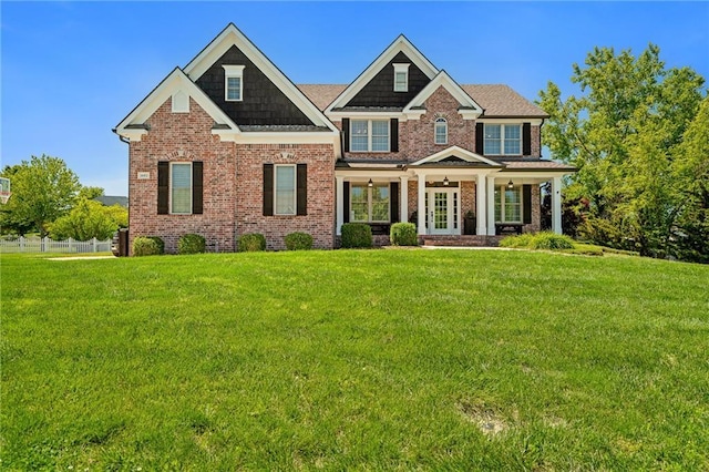 1602 SW Deer Run Rd, Oak Grove, MO 64075 - craftsman-style house with brick siding and french doors