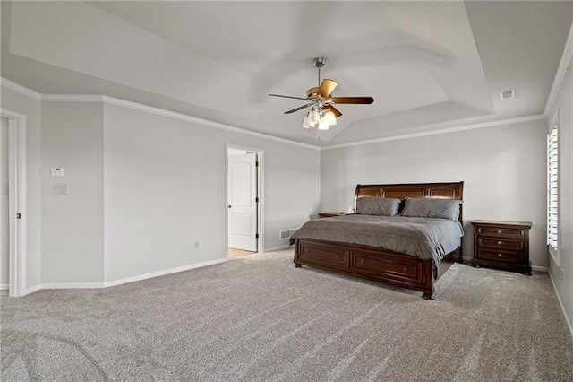 1602 SW Deer Run Rd, Oak Grove, MO 64075 - carpeted bedroom with baseboards, a tray ceiling, ornamental molding, and a ceiling fan