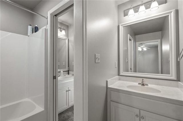 1602 SW Deer Run Rd, Oak Grove, MO 64075 - full bath with vanity, a ceiling fan, and bathing tub / shower combination