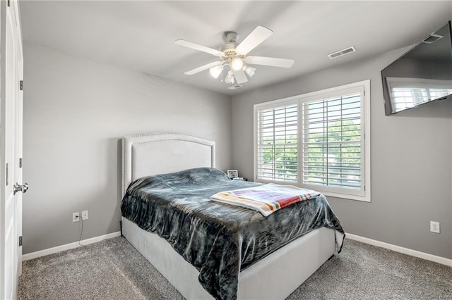1602 SW Deer Run Rd, Oak Grove, MO 64075 - bedroom with baseboards, carpet, and a ceiling fan