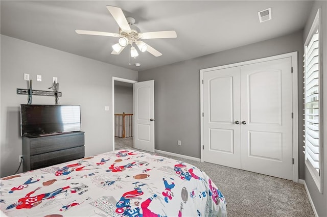 1602 SW Deer Run Rd, Oak Grove, MO 64075 - carpeted bedroom with a closet, ceiling fan, and baseboards