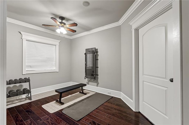 1602 SW Deer Run Rd, Oak Grove, MO 64075 - workout room featuring dark wood finished floors, ceiling fan, ornamental molding, and baseboards