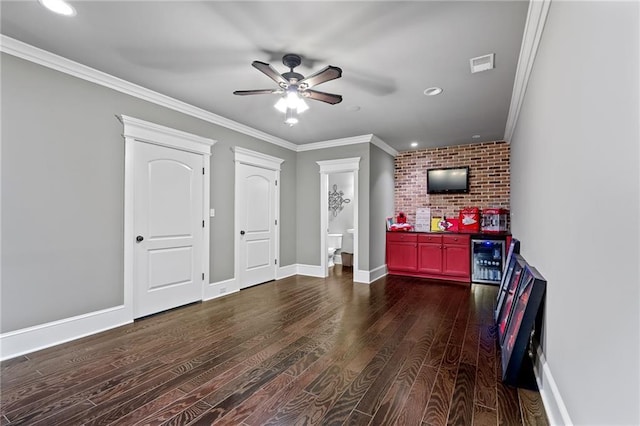 1602 SW Deer Run Rd, Oak Grove, MO 64075 - bar area with a ceiling fan, wood finished floors, crown molding, recessed lighting, and baseboards