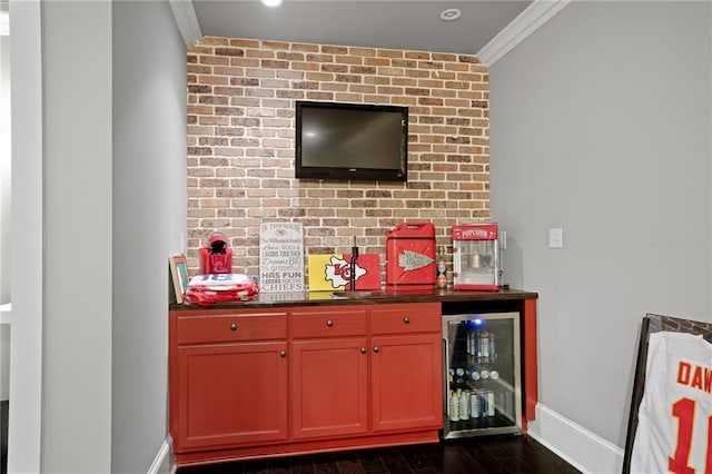 1602 SW Deer Run Rd, Oak Grove, MO 64075 - indoor dry bar featuring wine cooler, ornamental molding, baseboards, and dark wood finished floors