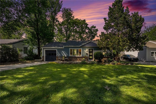 11410 W 68th Ter, Shawnee, KS 66203 - ranch-style house with a garage, driveway, and a yard