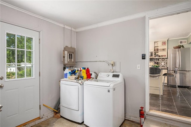 11410 W 68th Ter, Shawnee, KS 66203 - laundry area with electric panel, washer and dryer, and crown molding