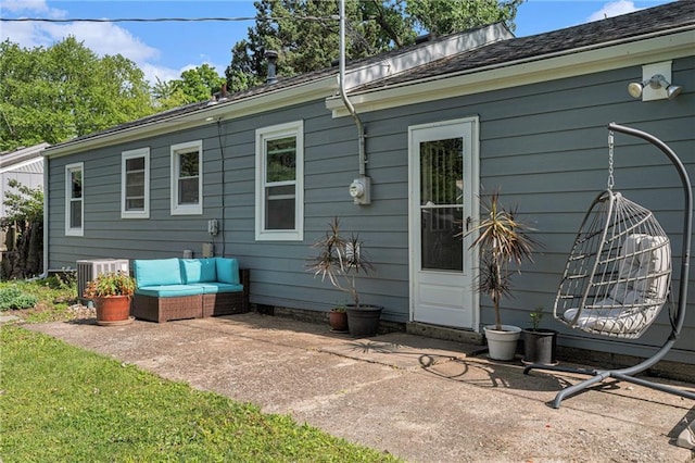 11410 W 68th Ter, Shawnee, KS 66203 - back of property featuring a patio area and central AC