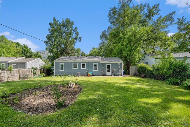 11410 W 68th Ter, Shawnee, KS 66203 - rear view of property with cooling unit