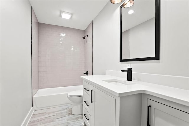 308 N 22nd St, Leavenworth, KS 66048 - bathroom featuring vanity, toilet, and shower / tub combination
