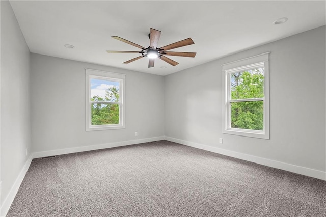 308 N 22nd St, Leavenworth, KS 66048 - spare room with plenty of natural light, carpet floors, a ceiling fan, and baseboards