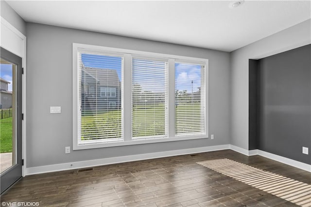 10429 W 170th Pl, Overland Park, KS 66221 - unfurnished room with dark wood-type flooring and baseboards