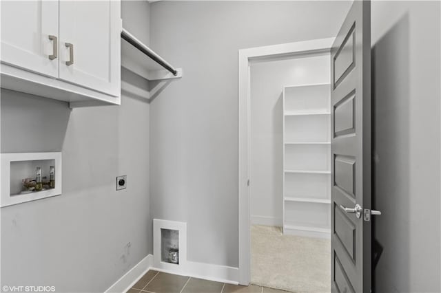 10429 W 170th Pl, Overland Park, KS 66221 - laundry room with hookup for an electric dryer, hookup for a washing machine, cabinet space, and dark tile patterned flooring