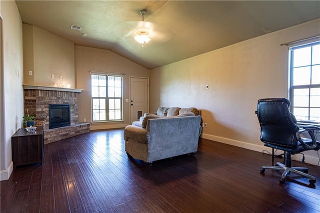 102 Zachary Ln, Carl Junction, MO 64834 - living room with a ceiling fan, hardwood / wood-style flooring, baseboards, a fireplace, and vaulted ceiling
