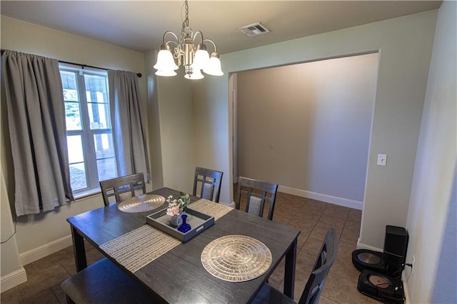 102 Zachary Ln, Carl Junction, MO 64834 - tiled dining space featuring a chandelier and baseboards