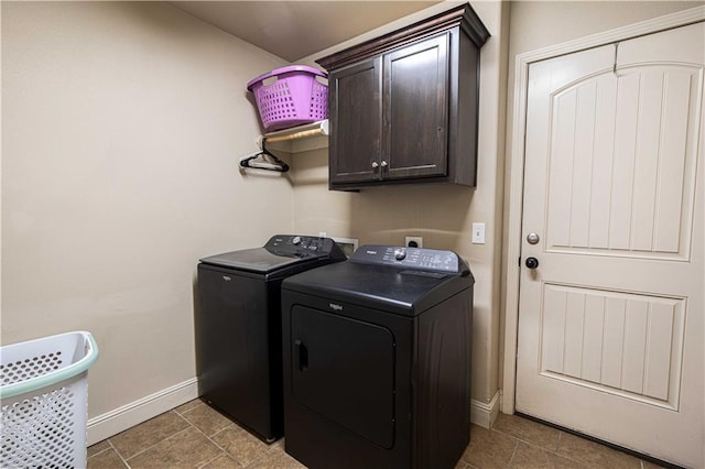 102 Zachary Ln, Carl Junction, MO 64834 - washroom featuring washing machine and clothes dryer, baseboards, and cabinet space