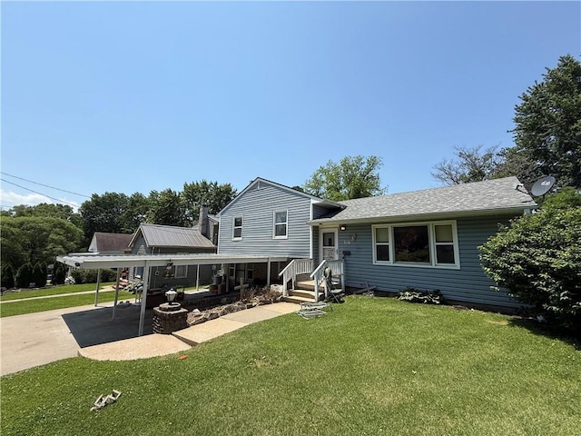 316 N 18th St, Lexington, MO 64067 - rear view of house featuring a lawn, a carport, roof with shingles, and driveway