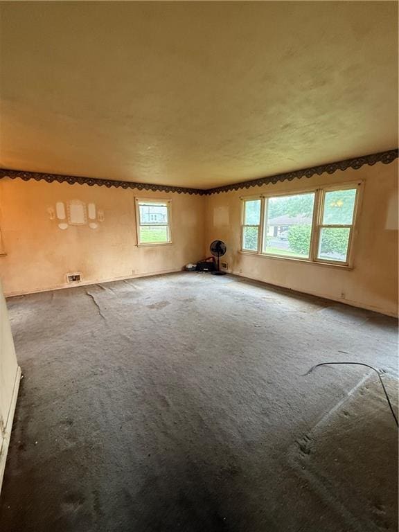 316 N 18th St, Lexington, MO 64067 - carpeted spare room featuring healthy amount of natural light