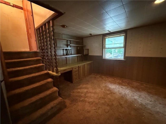 316 N 18th St, Lexington, MO 64067 - kitchen featuring wainscoting, wood walls, and carpet floors