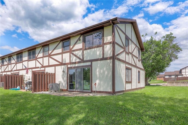 1101 Jeff Cir, Paola, KS 66071 - rear view of house with stucco siding
