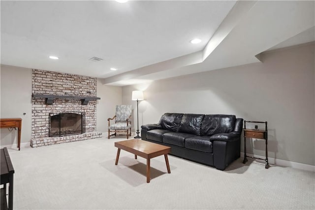 7710 Noland Rd, Lenexa, KS 66216 - living area with carpet floors, recessed lighting, a fireplace, and baseboards