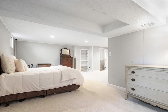 7710 Noland Rd, Lenexa, KS 66216 - bedroom with light colored carpet, baseboards, a textured ceiling, and recessed lighting