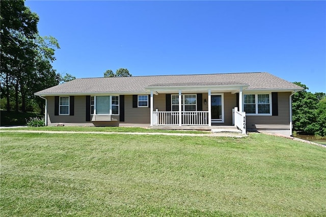 5406 N Northwood Rd, Kansas City, MO 64151 - single story home with a porch and a front lawn