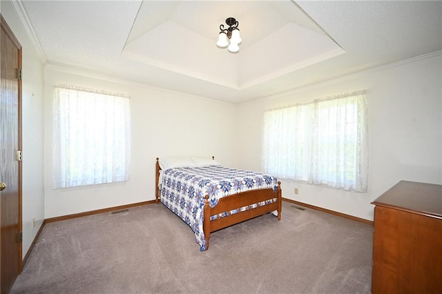 5406 N Northwood Rd, Kansas City, MO 64151 - bedroom with baseboards, a tray ceiling, carpet floors, and crown molding