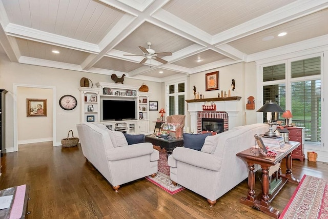 10309 S Oakcrest Ln, Olathe, KS 66061 - living area with dark wood-type flooring, ceiling fan, a brick fireplace, coffered ceiling, and baseboards