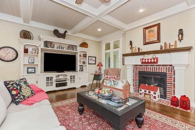 10309 S Oakcrest Ln, Olathe, KS 66061 - living room featuring wood finished floors, a fireplace, beam ceiling, recessed lighting, and coffered ceiling