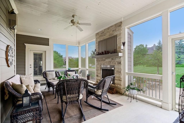 10309 S Oakcrest Ln, Olathe, KS 66061 - sunroom / solarium featuring an outdoor living space with a fireplace, a ceiling fan, crown molding, wooden ceiling, and wood finished floors