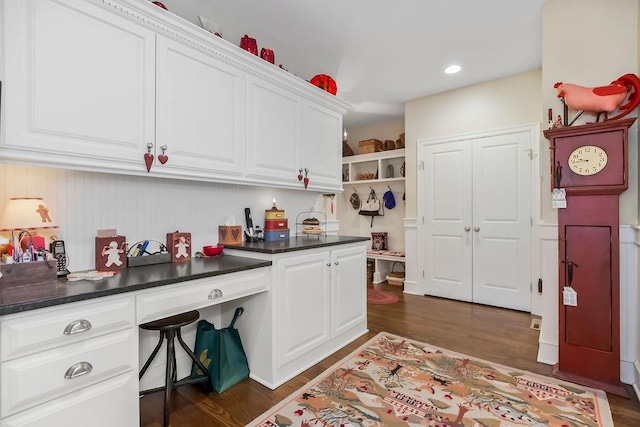10309 S Oakcrest Ln, Olathe, KS 66061 - kitchen featuring white cabinets, dark countertops, dark wood-style flooring, and recessed lighting