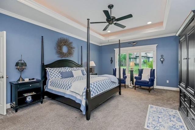 10309 S Oakcrest Ln, Olathe, KS 66061 - bedroom with a tray ceiling, light carpet, ornamental molding, baseboards, and ceiling fan