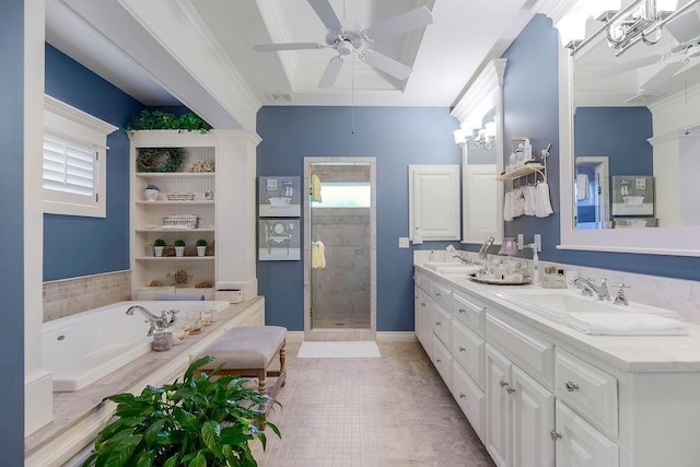 10309 S Oakcrest Ln, Olathe, KS 66061 - full bath featuring a shower stall, a garden tub, double vanity, a ceiling fan, and baseboards