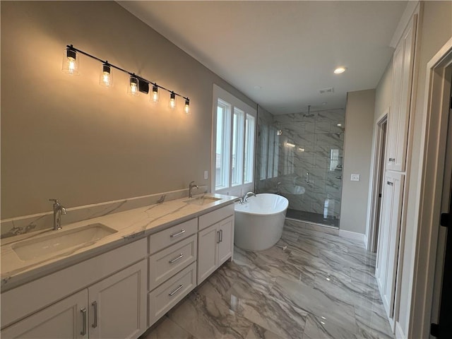 11494 S Longview Rd, Olathe, KS 66061 - full bath with a marble finish shower, marble finish floors, a freestanding tub, double vanity, and recessed lighting