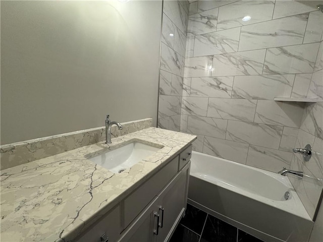 11494 S Longview Rd, Olathe, KS 66061 - bathroom featuring marble finish flooring, vanity, and bathtub / shower combination