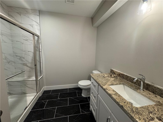 11494 S Longview Rd, Olathe, KS 66061 - full bathroom featuring a shower stall, vanity, toilet, and baseboards