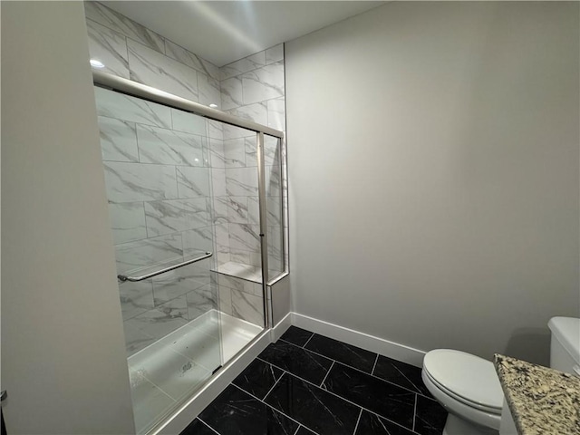 11494 S Longview Rd, Olathe, KS 66061 - full bathroom featuring marble finish floors, toilet, baseboards, a marble finish shower, and vanity