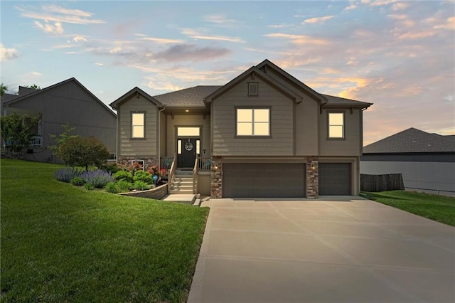 15700 NW 122nd St, Platte City, MO 64079 - view of front of house with a garage, stone siding, a lawn, and concrete driveway