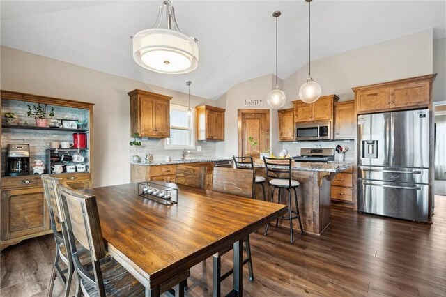 15700 NW 122nd St, Platte City, MO 64079 - dining room featuring lofted ceiling and dark wood finished floors