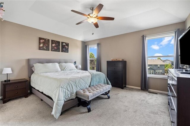 15700 NW 122nd St, Platte City, MO 64079 - bedroom with light colored carpet, baseboards, and a ceiling fan