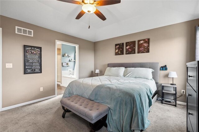 15700 NW 122nd St, Platte City, MO 64079 - bedroom with carpet floors, baseboards, ensuite bath, and a ceiling fan