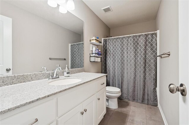 15700 NW 122nd St, Platte City, MO 64079 - full bathroom with toilet, vanity, tile patterned floors, and a shower with curtain