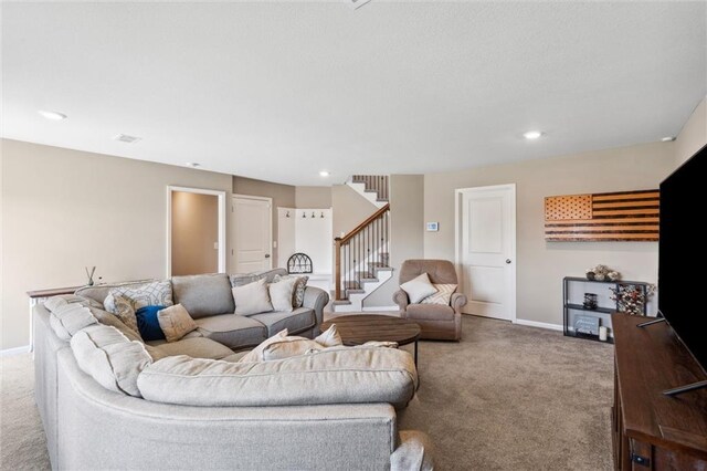 15700 NW 122nd St, Platte City, MO 64079 - carpeted living room featuring stairway, baseboards, and recessed lighting
