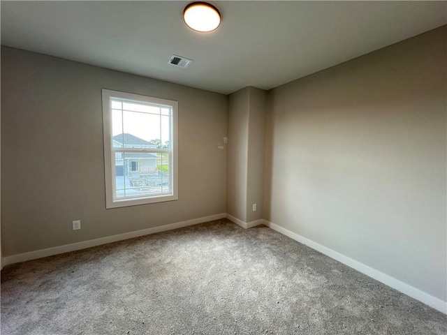 16977 S Mahaffie St, Olathe, KS 66062 - carpeted spare room featuring baseboards