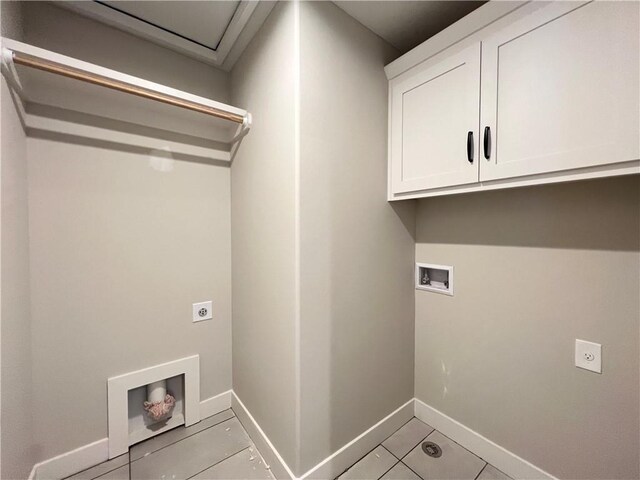16977 S Mahaffie St, Olathe, KS 66062 - laundry room with electric dryer hookup, cabinet space, washer hookup, and baseboards