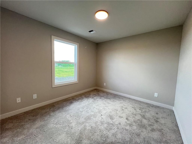 16977 S Mahaffie St, Olathe, KS 66062 - carpeted spare room featuring baseboards